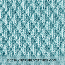 The Seersucker stitch is easy to knit and purl, resulting in a lovely and squishy texture. The pattern includes both written instructions and a chart.