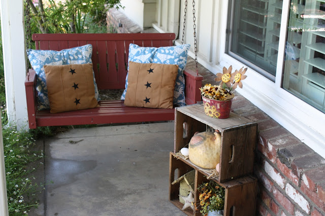 porch swing, pillows