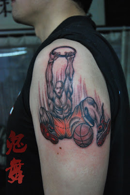 slam-dunking tattoo design on the arm