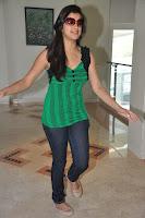 Madhurima in Sleeveless Green Top with Cool Glasses
