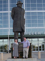 Joyce and Charlie Pinson, Kentucky Health Insurance Agents, in front of Vince Lombardi statue, outside Lambeau Field home of the Green Bay Packers