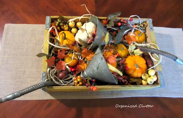 Funnels Re-Purposed as Fall Cornucopias http://organizedclutterqueen.blogspot.com/2013/10/funnels-re-purposed-as-fall-cornucopias.html