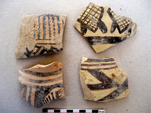 Bakun-style ceramics from Tol-e Siyah, Forg Valley, Iran. The artifact in the bottom-left contains a fragment of what appears to be a basket-weave style swastika.