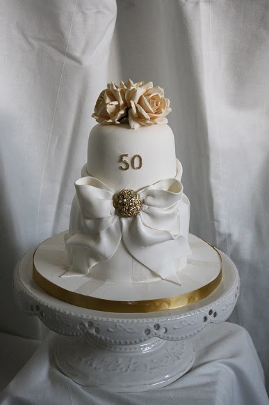  cake for a 50th Wedding Anniversary party Of course the gold decoration 
