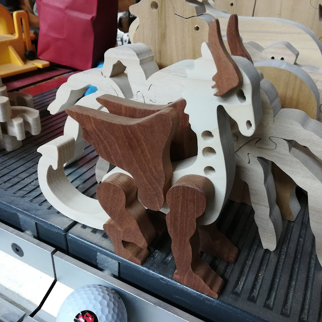 Handmade Wood Dragon Testing The Legs To See If They Are Even