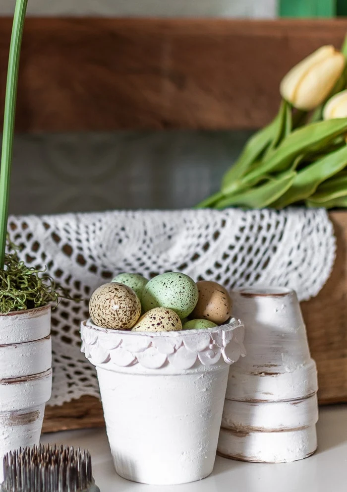 eggs in scalloped pot, vintage flower frog