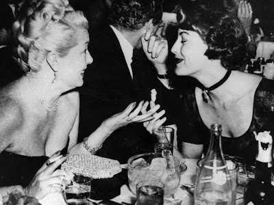 Dorothy Malone and Ann Sheridan 1952 Lana Turner and Ava Gardner 