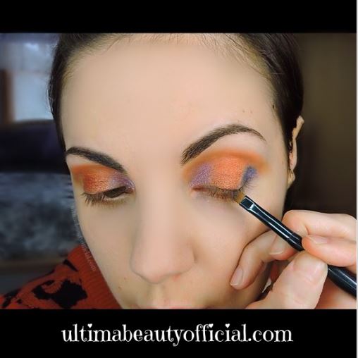 Ultima Beauty applying "Bless Your Tart" with a brush