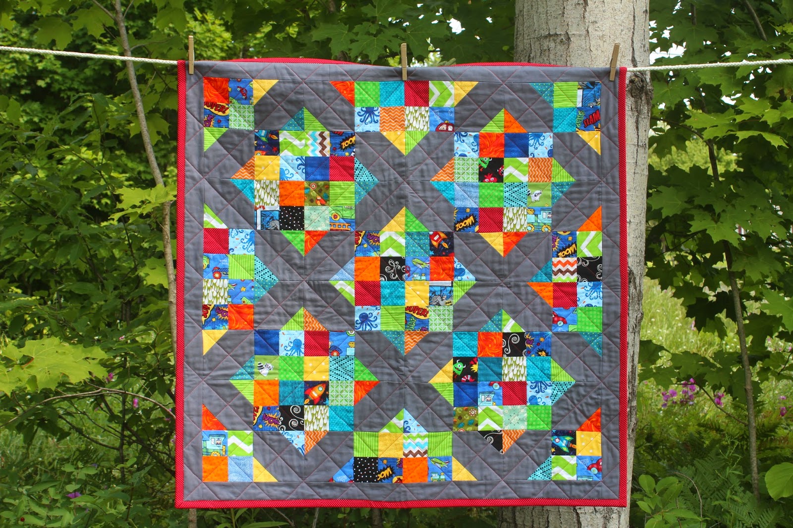 http://ahodgepodgeadventure.blogspot.com/2014/07/the-scrappy-crossroads-quilt-round-2.html