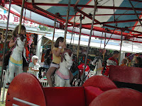 Sue Rides The Carousel