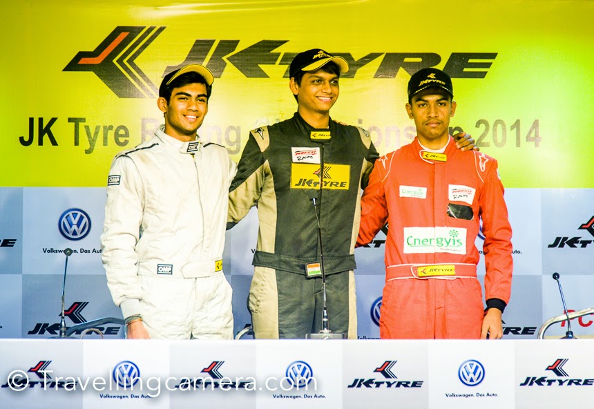 This weekend Photo Journey team was at Budhh International Circuit to experience Motorsports at JK Tyre Racing Championship. The 3rd round races happened on 9th Nov at India's Budhh International Circuit in Great Noida. This Photo Journey shares some action filled moments from the BIC tracks full of roaring supermachines.Event was planned to start at 10:30 and we were there at around 10am. It took some time to locate Paddlock club of Budhh International Circuit. Finally we reached the right place and met other friends at JK Tyre lounge. Things were just warming up at that moment. The pit was just below the lounge and this place had perfect view to the place from where race starts.Here is the view of Grand Stand from Paddlock area where all the supermachines were gearing up for real action.JK Tyre has always been closely associated with the world of sports. Almost three decades back the company laid down a long term and sustained approach to promote Motorsport. Participating in this form of the sport has helped the company in continuously updating its products to meet the challenges of gruelling Indian conditions. The sport at that time in India was perceived for elite but JK Tyre took upon itself to package and redesign the sport to suit the masses. The company not only made the sport affordable but also equivalent to International operating standards. JK Tyre’s foray into Motorsport was a well thought out strategic decision to not only use and develop this virgin branding platform but also to realize the dreams of making India a force in the field of motor sport.In 2011, the company acquired the Formula BMW Series and rechristened it as the JK Racing Asia Series (JKRAS). With this acquisition, JK Tyre created history in Indian Motorsport by becoming the first Indian company to acquire an FIA accredited series. The series has to its credit of producing as many as six of the current Formula One drivers, including reigning two- time champion Sebastian Vettel. This series was then converted to JK Racing India Series from 2013 to give more impetus to Indian talent in motorsports. JK Tyre now stands closer to achieving its mission of bringing world-class motorsport to the Indian masses.The Racing and Karting programme by JK Tyre has been the breeding ground for the country’s motorsport talents like Narain Karthikeyan, Armaan Ebrahim, Karun Chandhok, Aditya Patel and other new emerging talents.Vibha enjoyed the races from comfortable lounge, while I was having more fun around the tracks and of course, with my Travellingcamera.It was great to be around Motorsport enthusiasts. And after a long time, I met lot of friends from Himalayan & Northern Motorsports.We were really excited to be around these roaring machines at Budhh International Circuit. One of the friends had pass for service lane, so we could drive in the service lane to catch these fast moving machines at different parts of the track.Grand Stand of Budhh International Circuit was full of Motorsports enthusiasts.During lunch at JK Tyre lounge, there were some amazing performances organized. These girls were playing Indian songs and their performances were amazing.Safety Car waiting on the track to take a round of the track before rides hit the race ground.The newly introduced JK Super Bikes Cup received a resounding response with the grandstand getting choc-a-bloc to watch riders perform stunts and tricks besides racing the track.Delhi boy Kulwant Singh Monty got the best finish clocking 16:55.583. Gurvinder Singh and Bhupinder Singh followed Kulwant into the podium by finishing 2nd and 3rd showcasing their skills in 1000CC engine bikes.JK Racing India Series FB02 (Race 3): 1. Vishnu Prasad (Chennai) 21:51.177, 2. Akhil Rabindra (Bangalore) 21:58.631; 3. Ananth Shanmugam (Bangalore) 21:59.815; 4. Nayan Chatterjee (Mumbai) 22.09.303; 5. Sandeep Kumar (Chennai) 22:10.497Formula LGB 4 (Race 3): 1. Diljith TS (Dark Don) 20:02.245, 2. Vishnu Prasad (Meco Racing) 20:02.574, 3. Raghul Rangaswamy (Meco Racing) 20:02.912, 4. Ameya Bafna (Rayo Racing) 20:05.763, 5. Chittesh S Mandody (Meco Racing) 20:06.172.Racing India Series FB02 (Race 2): 1. Vishnu Prasad (Chennai) 22:00.295, 2. Rahil Noorani (Mumbai) 22:14.946, 3. Akhil Rabindra (Bangalore) 22:18.461; 4. Sandeep Kumar (Chennai) 22:19.893; 5. Ananth Shanmugam (Bangalore) 22:20.469.VW Polo R Cup (Race-2): 1. Dylan Pereira (Poland) 22:11.363, 2. Karminder Pal Singh (New Delhi) 22:14.271, 3. Karthik Tharani (Chennai) 22:16.562, 4. Gosia Rdest (Poland) 22:17.416, 5. Bonnie Thomas 22:19.586 (Thodupuzha)JK Super Bikes Cup: Kulwant Singh Monty- 16:55.583, Gurvinder Singh- 17:01.653, Bhupinder Singh- 17:03.102, Manmeet Singh- 17:55.816, Aashir Agarwal:- 18:16.258.