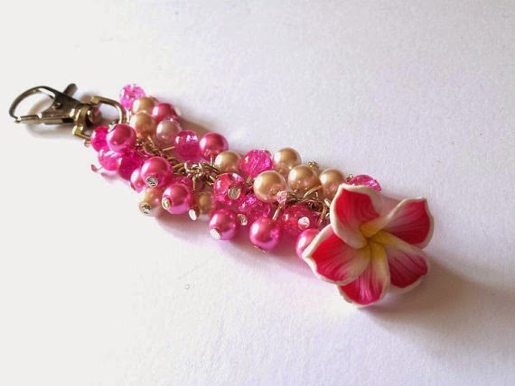 https://www.etsy.com/listing/218508438/pretty-flower-bag-charm-filled-with-pink?ref=shop_home_active_13