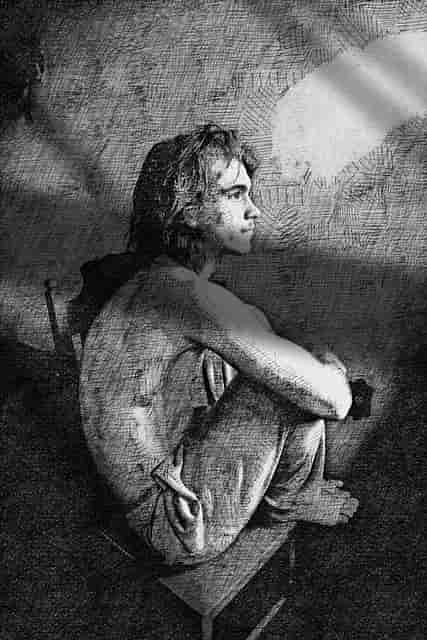 This is a pencil sketch of of a man seated on a chair with his feet resting on the edge of the chair. He doesn't have on any shirt. This picture reflects the fiction story of a Romanian boy named Alexandru who traveled in a treacherous was to give his mother a letter on Mothers' day.