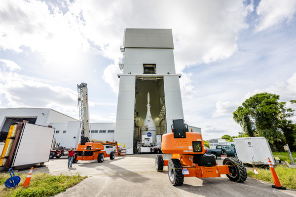 The transporter carrying the Orion Artemis 1 spacecraft prepares to exit from the Launch Abort System Facility to make its way to the Vehicle Assembly Building at NASA's Kennedy Space Center in Florida...on October 18, 2021.