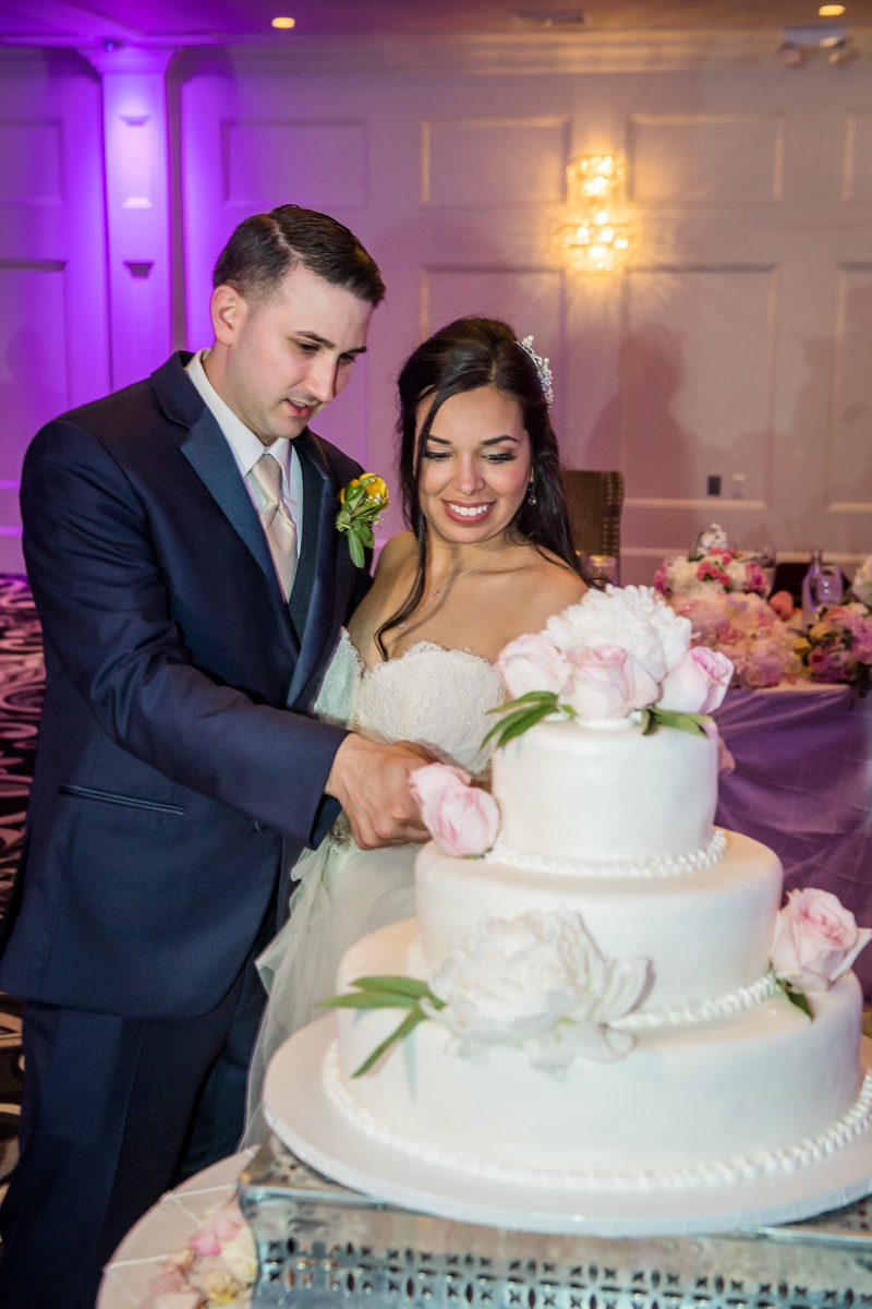 Couple Cutting The Cake