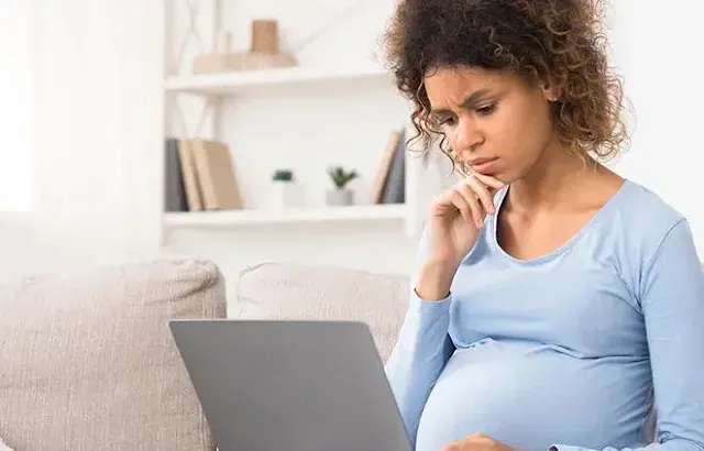 A Pregnant Woman Searching Solutions for Skin Darkening During Pregnancy