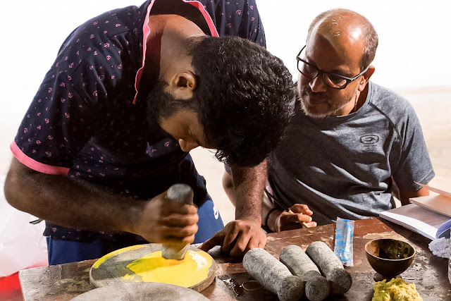 Kochi-Muziris Biennale: Laterite stones manually ground down provided one hue of yellow