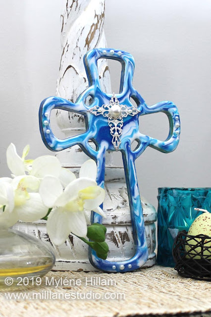 Marbled blue resin cross with filigree and acrylic pearls for decoration