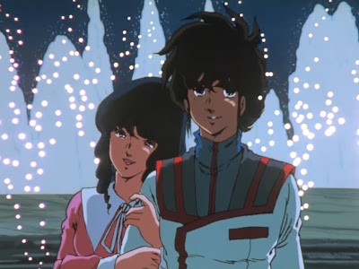 Hikaru takes a photo with Minmay on the eve of his first mission.