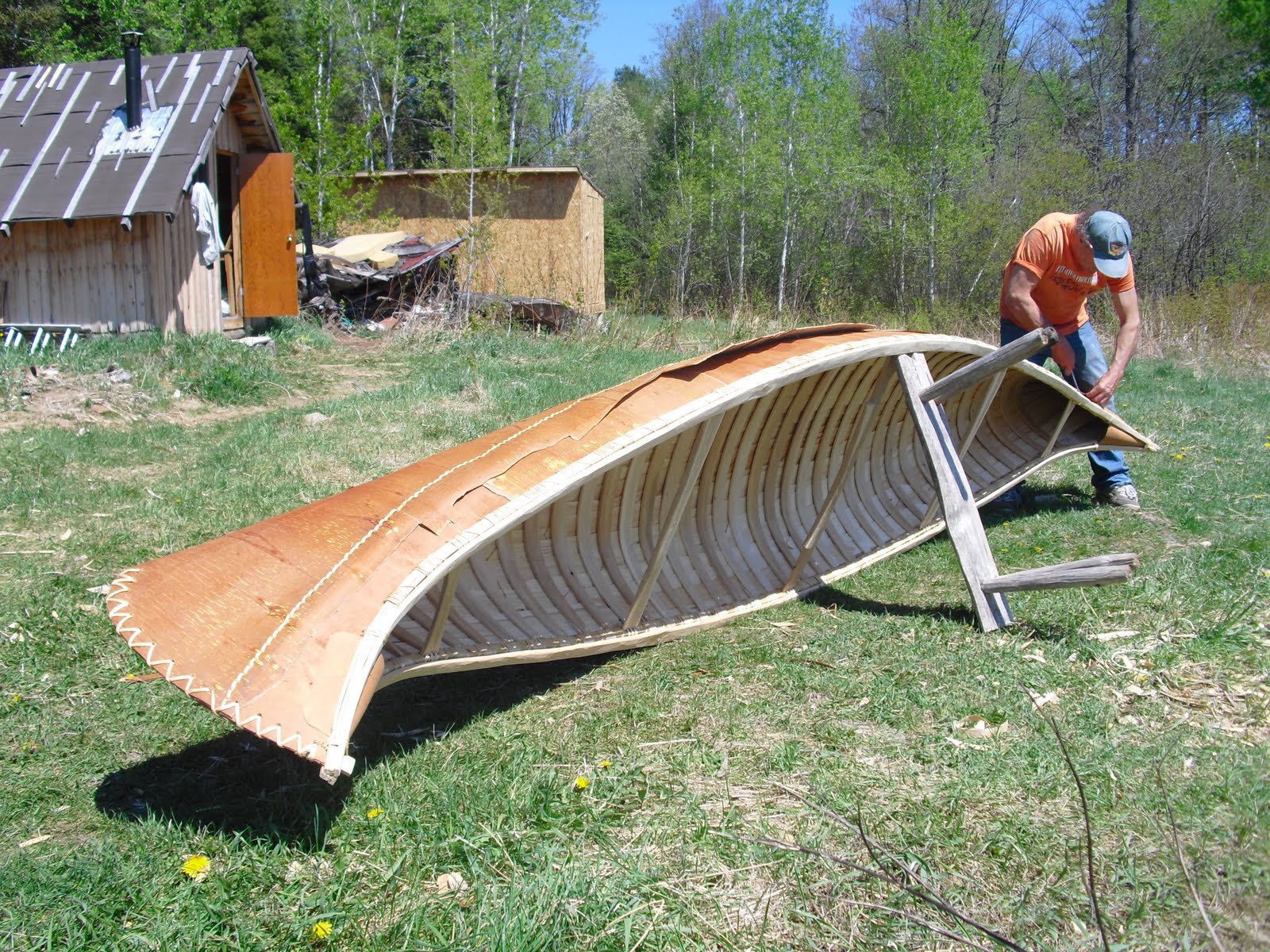 Making of the birch bark canoe: Gunwale cap and Gumming, almost 