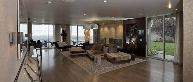 Picture of large modern living room with brown colors
