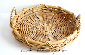round, flat basket with handles