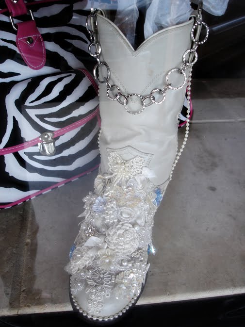 Here's a lovely cowgirl boot in a shop window surely created with a cowboy