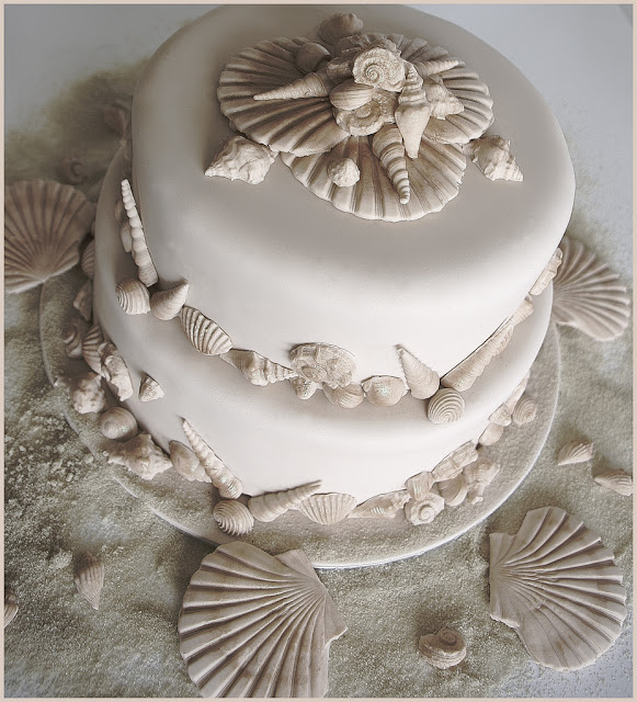 This fabulous Beach Wedding Cake is covered in ivory sugarpaste and 