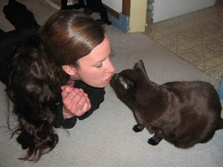 Cat supplies-YouPetsPlanet.Blogspot.Com-Pet Stories-Black cat kiss girl