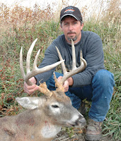 Brett with his 2012 rifle deer. Nebraska Trophy Whitetails