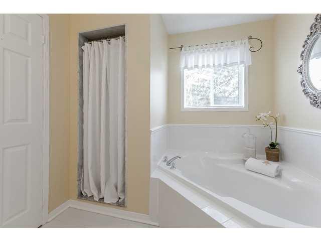 90s Builders Grade Ensuite Before - Small Shower Corner Tub