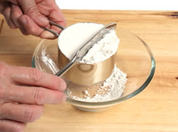 Sifting one (1) cup of Flour