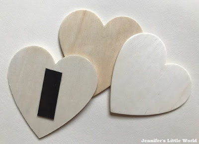 Decorated wooden heart magnets for Valentine's Day