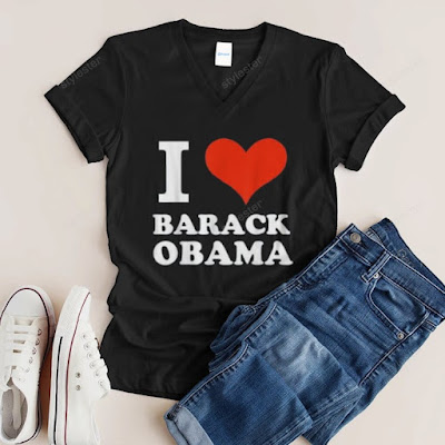 Black t-shirt with "I Love Barack Obama" text and red heart, laid with jeans and white sneakers