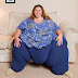 'I blame it on my genes': 700lb Californian woman enters the record books as the world's fattest woman