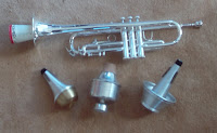 Diferentes tipos de surdina para trompete.