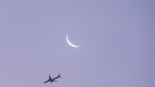 Moon and aeroplane