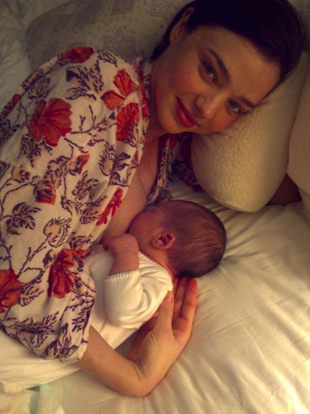 miranda kerr and orlando bloom baby flynn. Baby Flynn wears a gown by