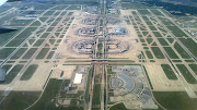 Last May, I took this photo of DFW Airport as we flew past on our way to . (dfw airport from north px)