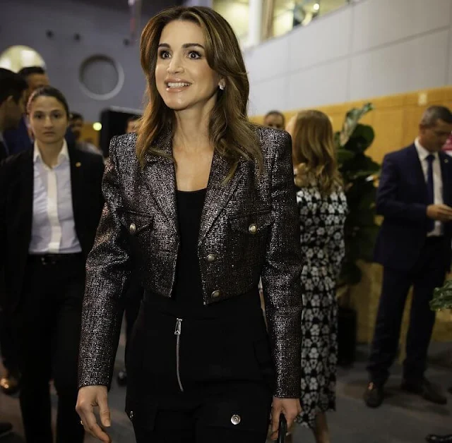 Queen Rania wore a metallic tweed cropped jacket by Alessandra Rich. Bottega Veneta high-waisted boot cut zip pants