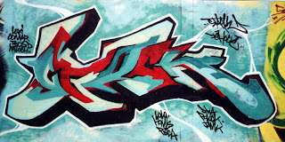 Graffiti names alex in the wall