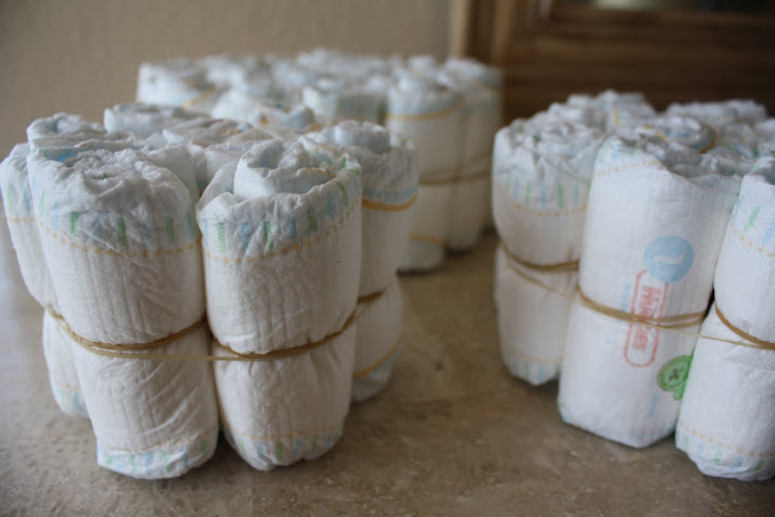 How To Make A Diaper Cake Without Rolling. make a basic diaper cake,