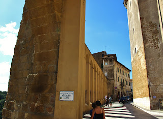 Walking in the shadow of the Medicean aquaduct of Pitigliano, Grosseto, Tuscany, Italy 