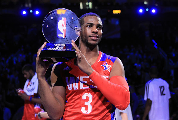 Chris Paul #3 of the Los Angeles Clippers and the Western Conference celebrates after winning MVP in the 2013 NBA All-Star game at the Toyota Center on February 17, 2013 in Houston, Texas.