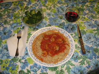 cooking Greek prawns with rice