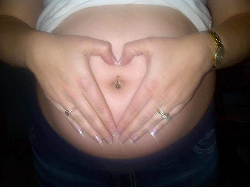 Here's the photo of when we took out the belly button ring months ago! title=