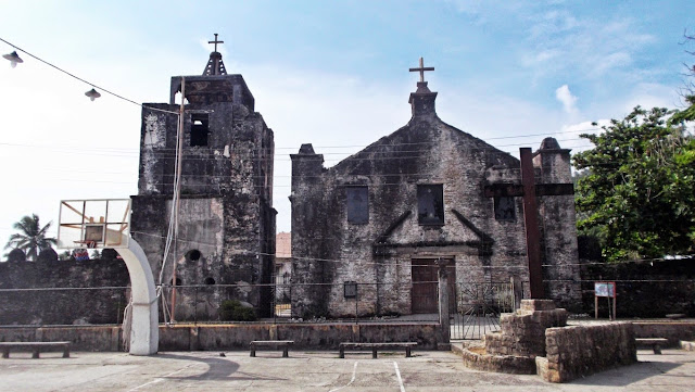 front view of the Capul Church and bell tower vied from the town plaza