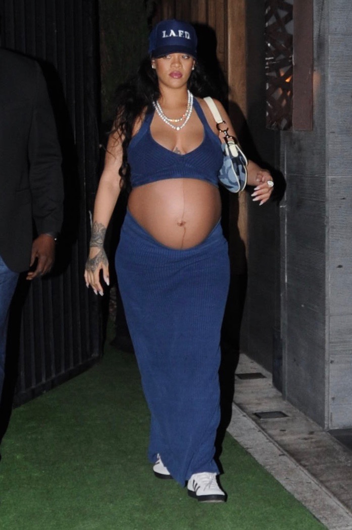 Rihanna shows off her BABY BUMP in bra top and skirt after dinner with ASAP Rocky at Nobu in Los Angeles.