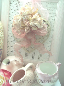 Framed heart with small pink pitchers
