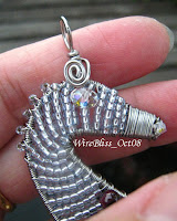 the head of the wire wrapped seahorse pendant